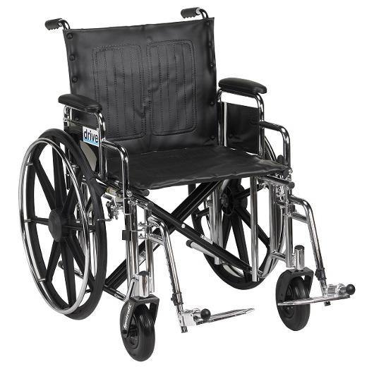 a basic black manual wheelchair with unpadded seat and folding frame, viewed from the front at an angle