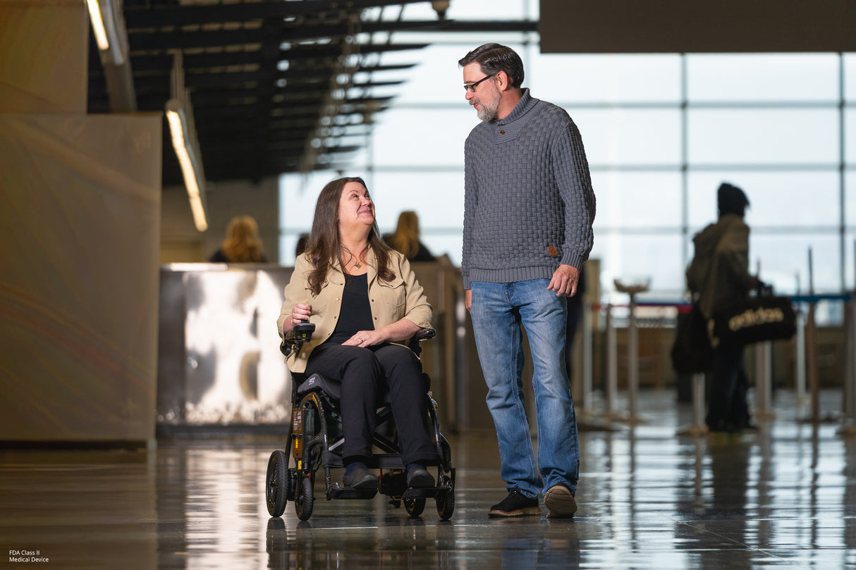 Pride Mobility Jazzy Carbon 27X in Airport