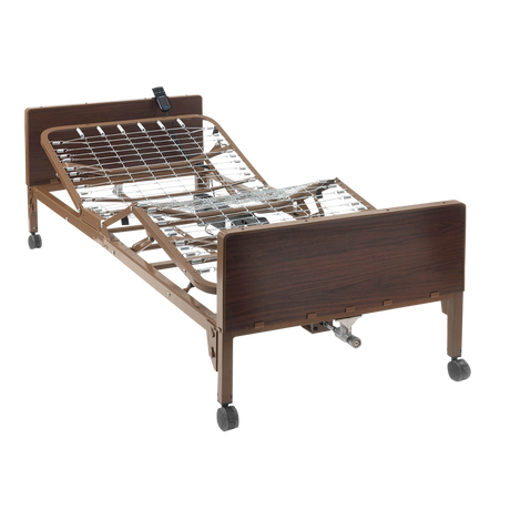 a hospital bed frame with brown wood laminate headboard and footboard and caster wheels, viewed without a mattress from the front at an angle with the head and legs in the elevated position