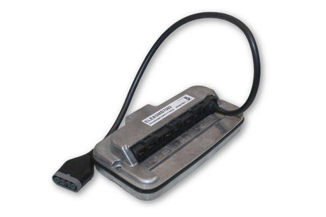 a black and gray metallic power chair component with a black cable beside it