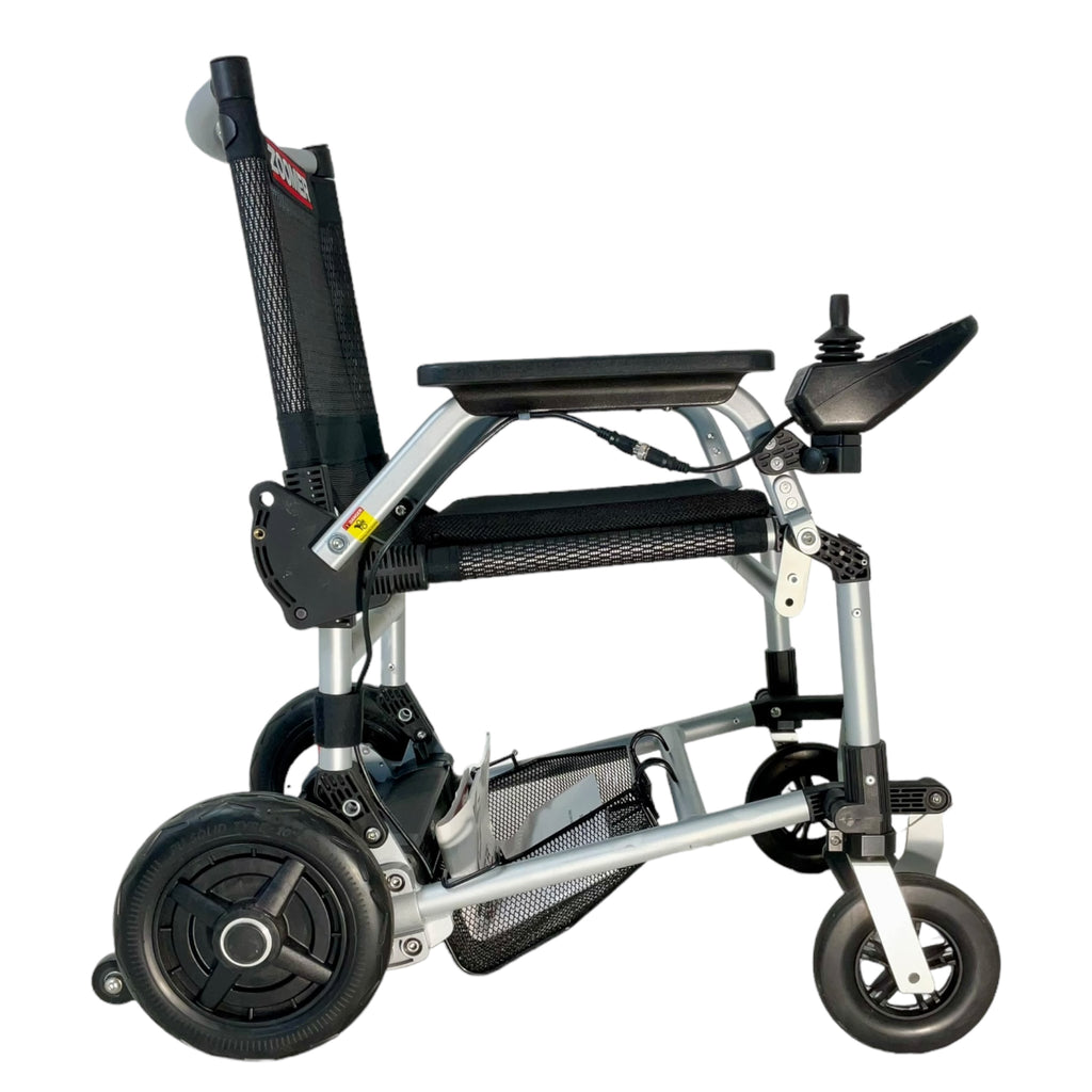 Right profile view of Zoomer power chair