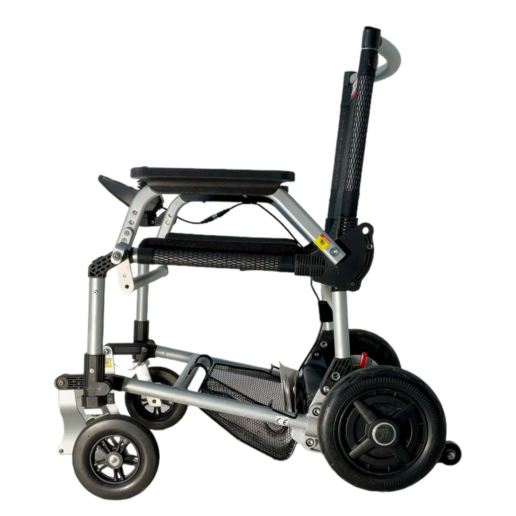 Left profile view of Zoomer power chair