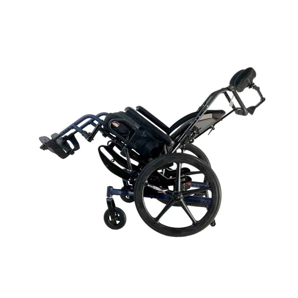 Left side view of tilted Ki Mobility Focus CR Tilt-In-Space Manual Wheelchair
