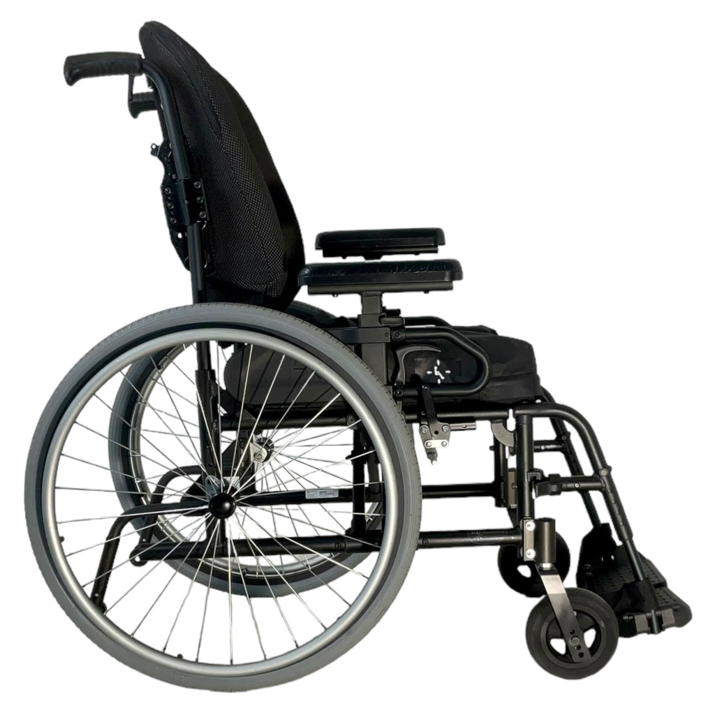 Right profile view of Ki Mobility Catalyst 4 wheelchair