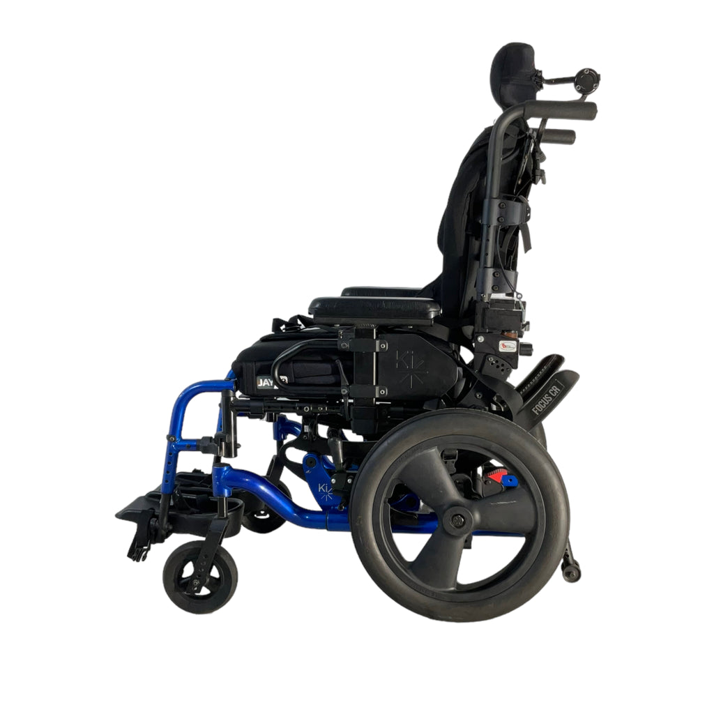 Left side view of Ki Mobility Focus CR Tilt-in-Space wheelchair