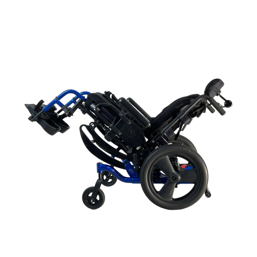 Left side view of tilted Ki Mobility Focus CR Tilt-in-Space wheelchair