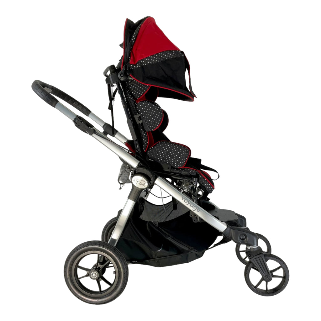 Right profile view of upright Quickie Zippie Voyage stroller