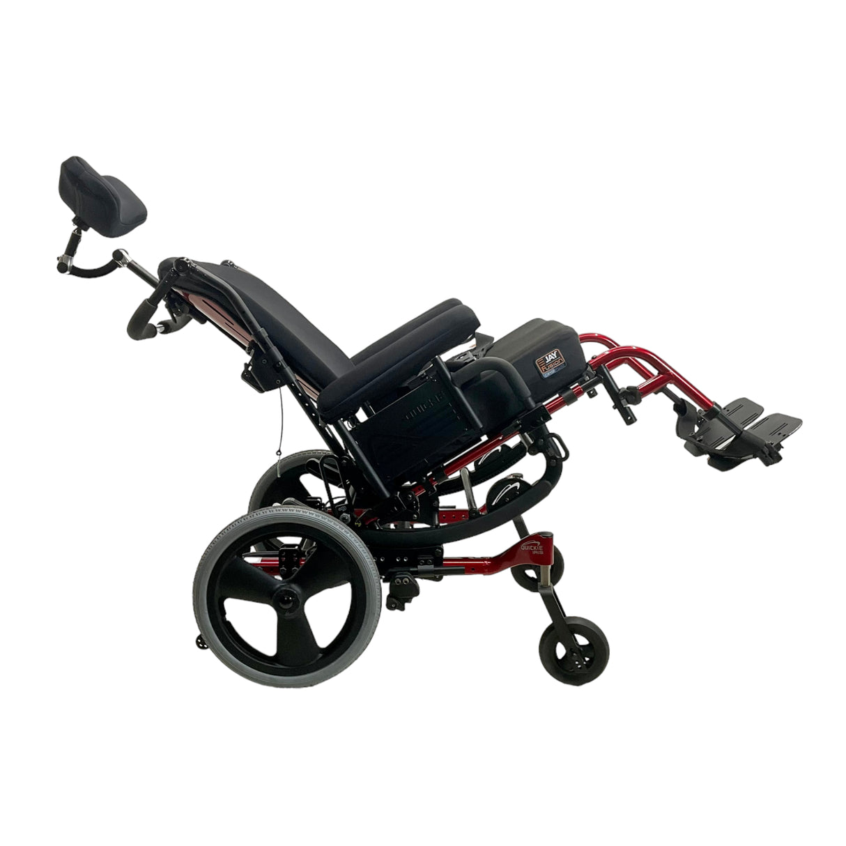Side view of Sunrise Medical Quickie Iris Tilt-in-Space Manual Wheelchair in tilted position
