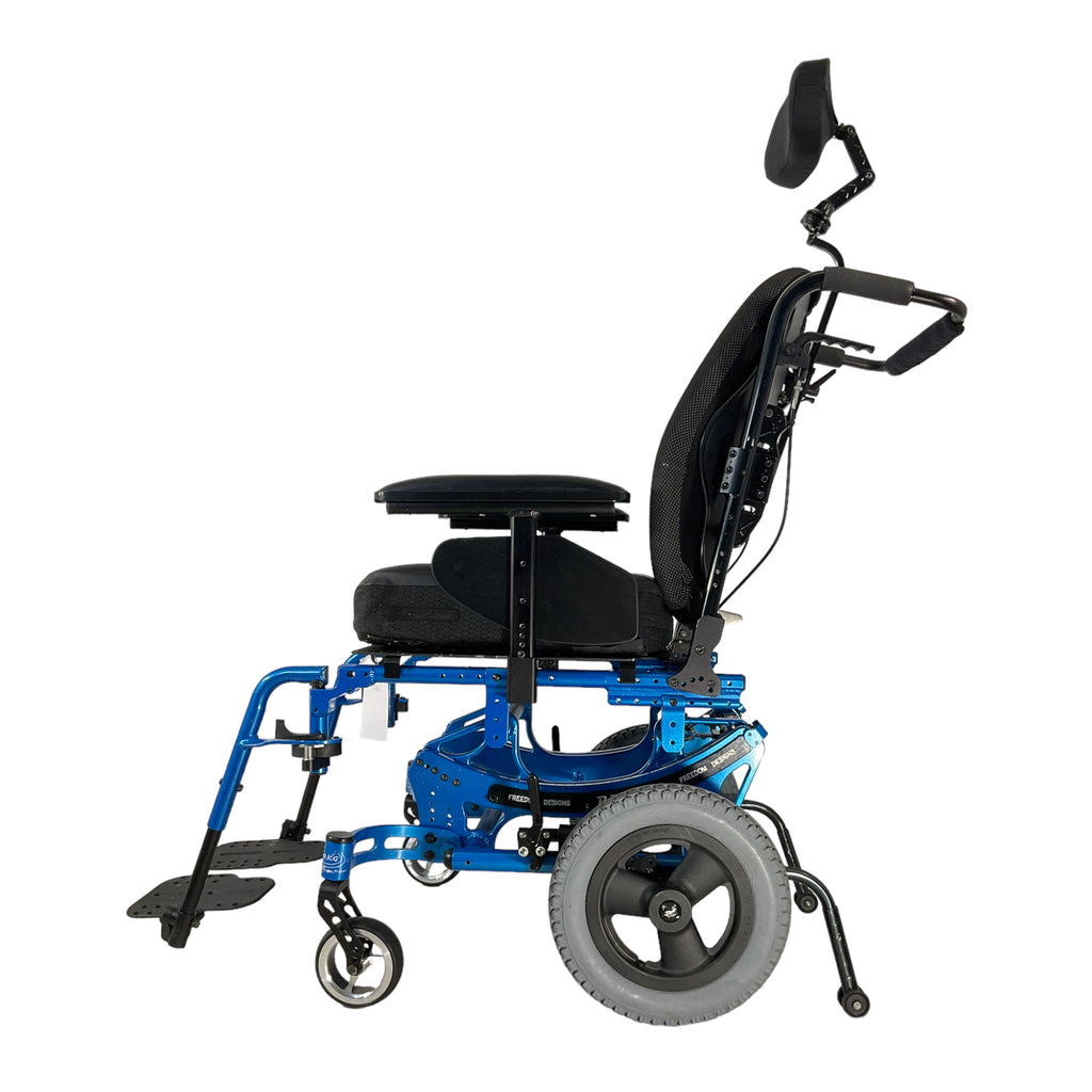 Left side view of Tilt-in-Space Freedom Designs P.R.O. CG Manual Wheelchair