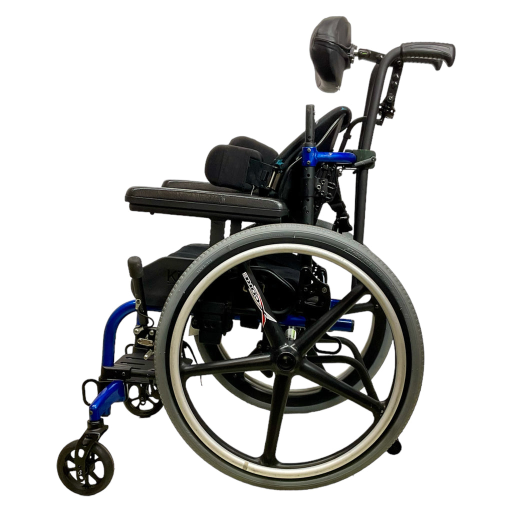 Left profile view of Ki Mobility Little Wave Clik XPE Pediatric Wheelchair