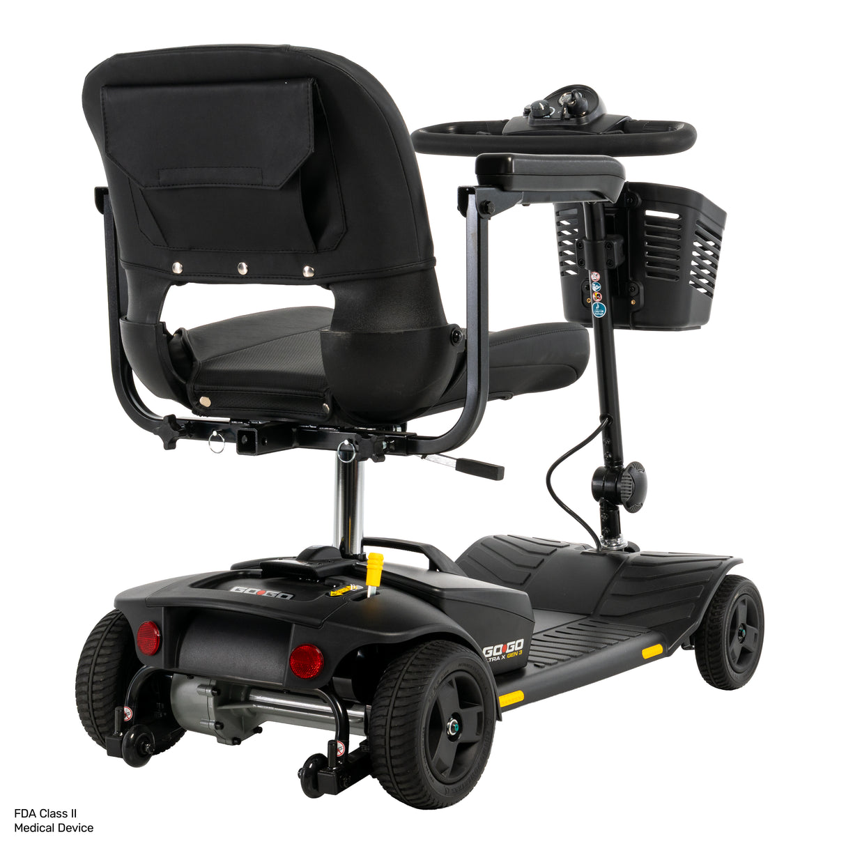 Black electric medical mobility scooter with a high-back seat, steering wheel, side storage basket, and rear wheels, shown on a white background with a small 'FDA Class II Medical Device' text label in the bottom left corner.