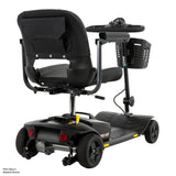 Black electric medical mobility scooter with a high-back seat, steering wheel, side storage basket, and rear wheels, shown on a white background with a small 'FDA Class II Medical Device' text label in the bottom left corner.