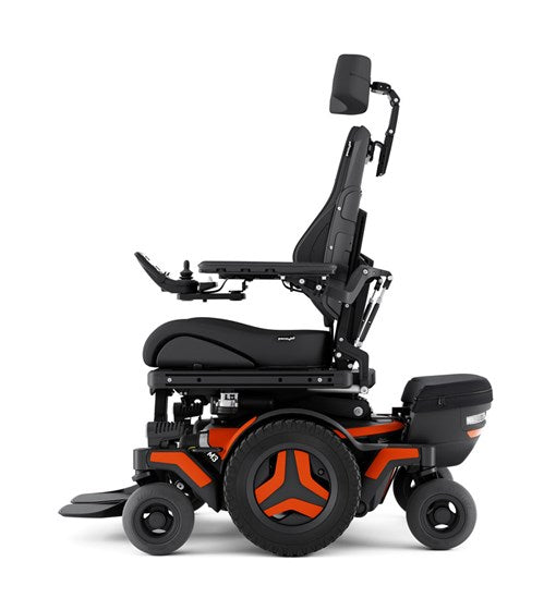 Side view of Permobil M3 with Essentials Carrier attached