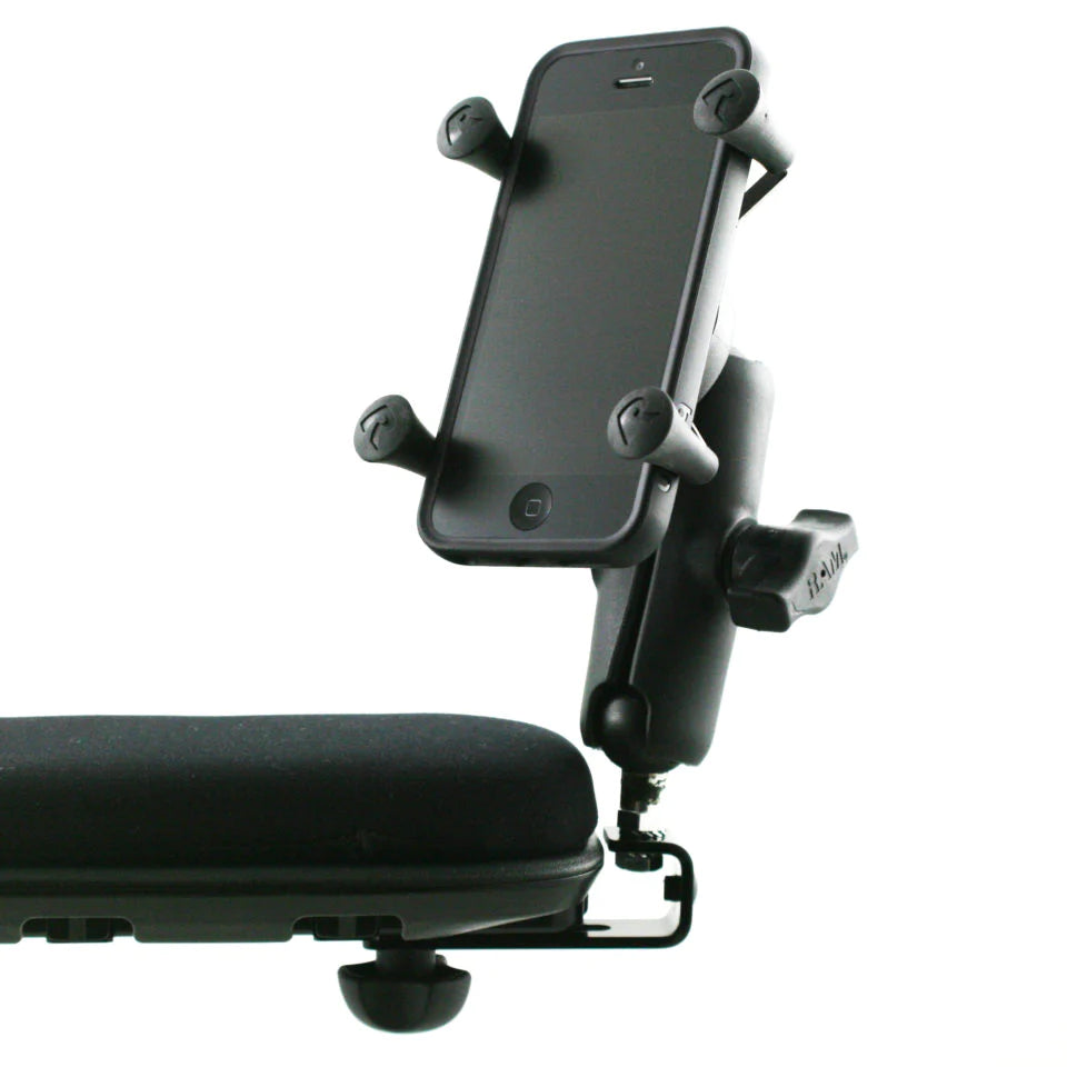 Ram X-Grip Phone Holder, attached to the armrest of a Permobil electric wheelchair, holding a smartphone